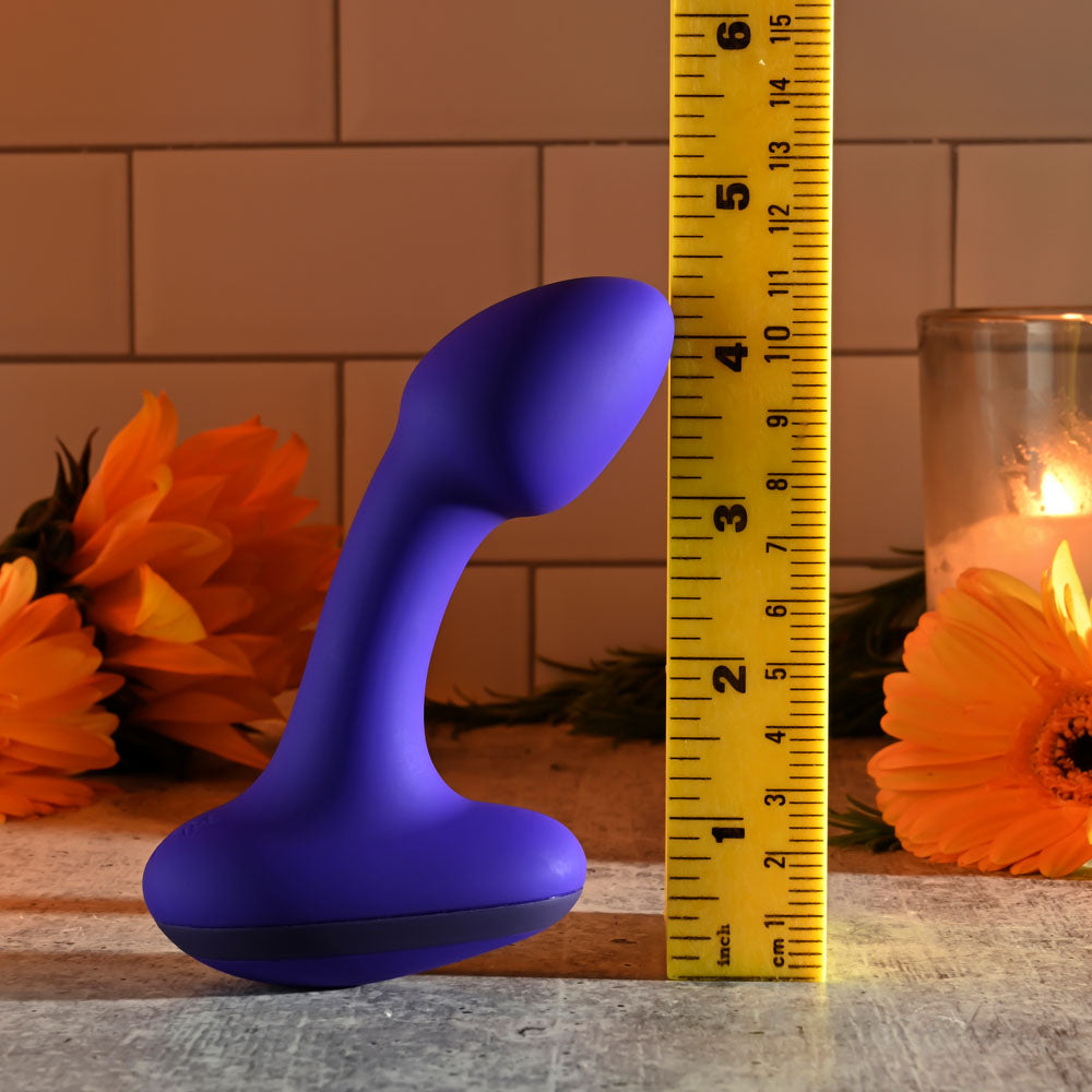 Gender X ANYBODYS PLUG -  11.4 cm USB Rechargeable Vibrating Butt Plug next to a ruler for size reference.