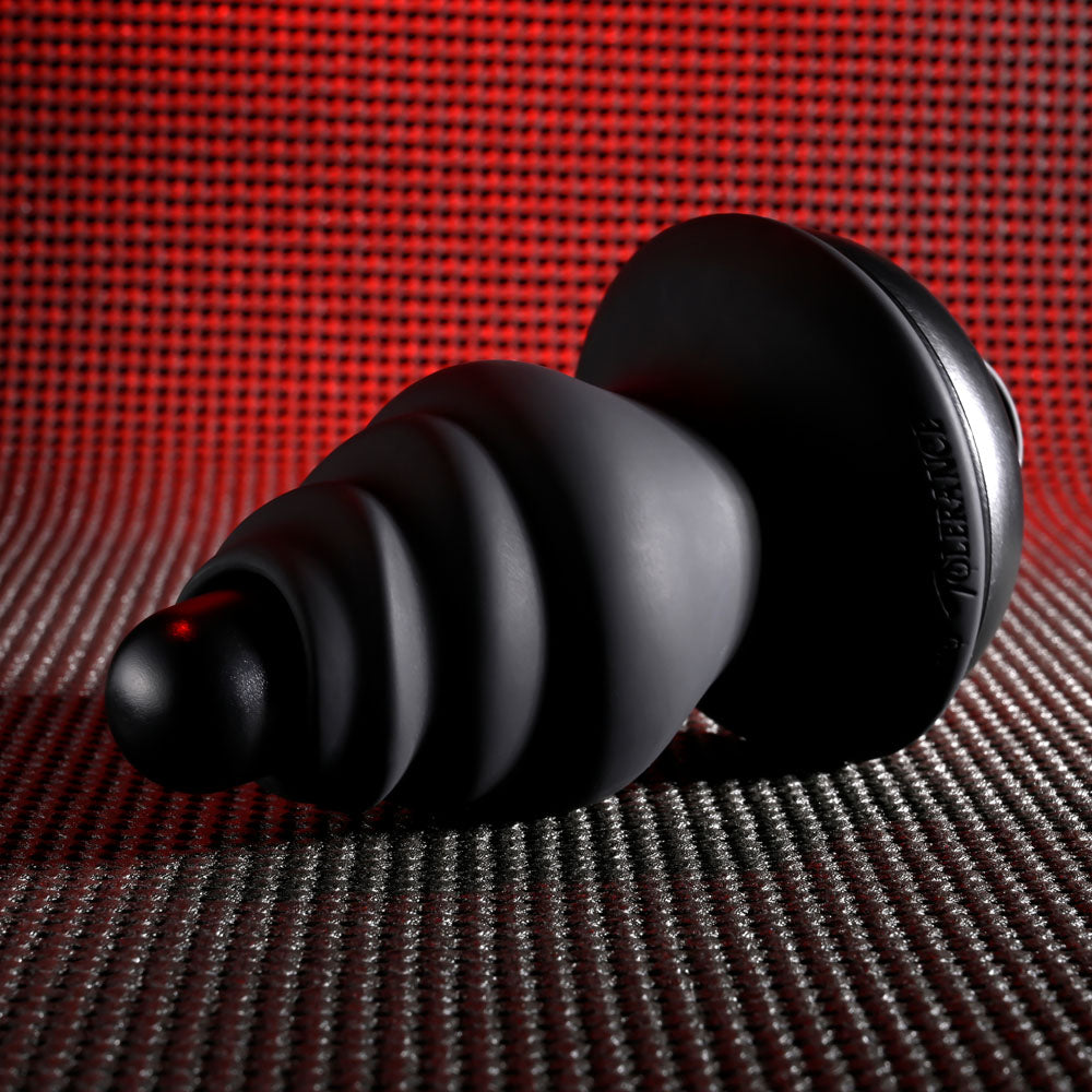 Gender X ECHO -  15.3 cm USB Rechargeable Butt Plug on a textured background.