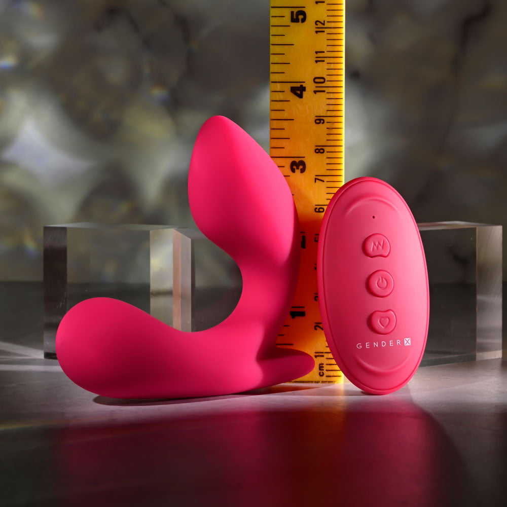 Gender X ALL ABOUT THE BASS -  USB Rechargeable Wearable Vibrator with Wireless Remote beside a ruler.