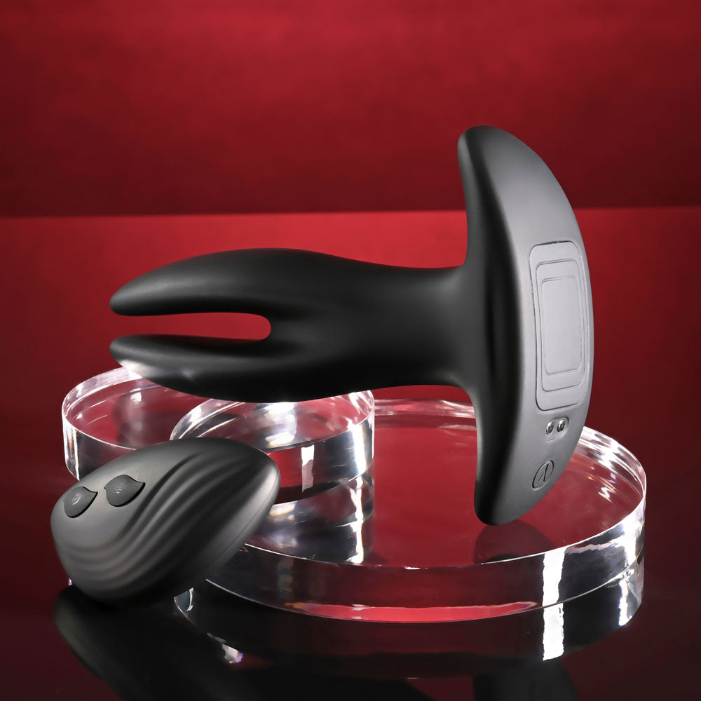 Gender X SPREAD THE LOVE -  USB Rechargeable Stretching Anal Plug with Wireless Remote on display with remote.