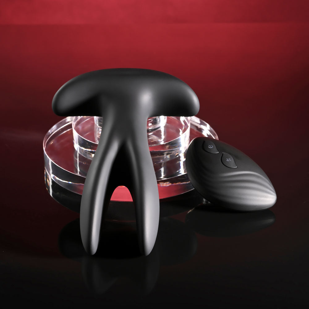 Gender X SPREAD THE LOVE -  USB Rechargeable Stretching Anal Plug with Wireless Remote on display.