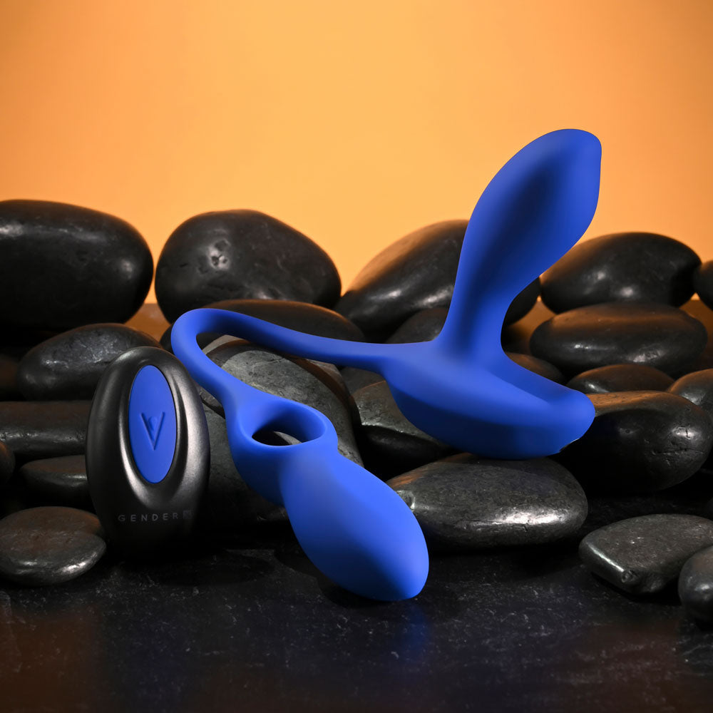 Gender X BACK FOR MORE - Dual USB Rechargeable Dual Stimulator with Wireless Remote on smooth black stones.