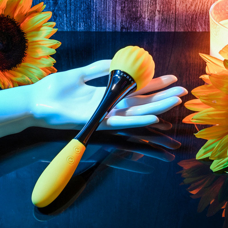 Gender X SUNFLOWER - 20 cm USB Rechargeable Massage Wand displayed on a hand with sunflowers.
