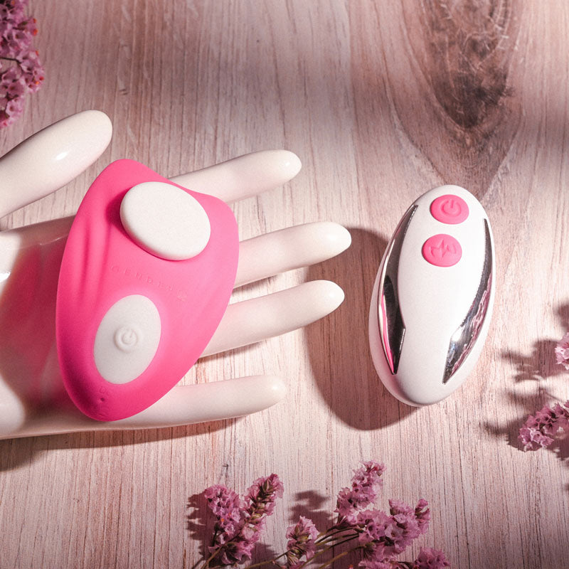 Gender X UNDER THE RADAR -  USB Rechargeable Panty Vibe on a hand, showcasing sleek design and easy-to-use controls.