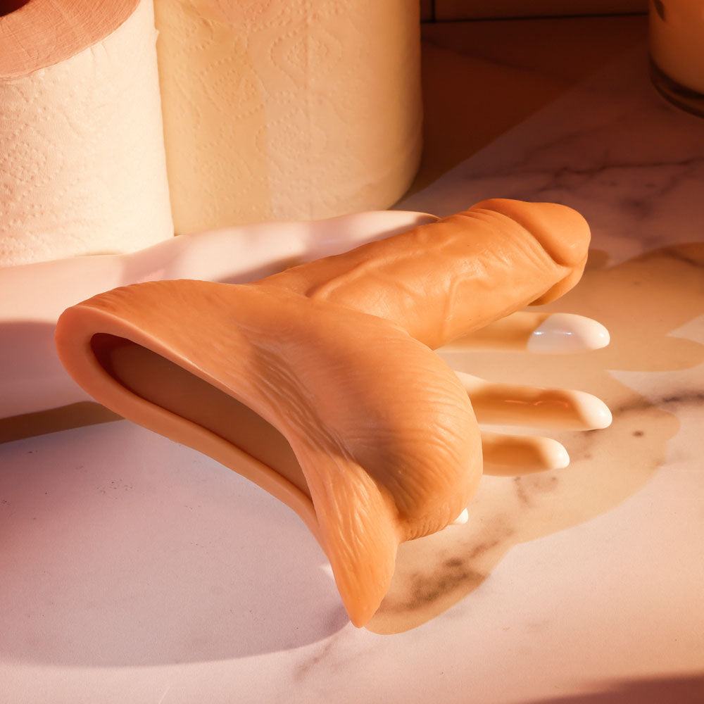 Gender X STAND TO PEE - Light - Realistic Stand-To-Pee Funnel displayed on a surface with soft textures and lifelike detail.