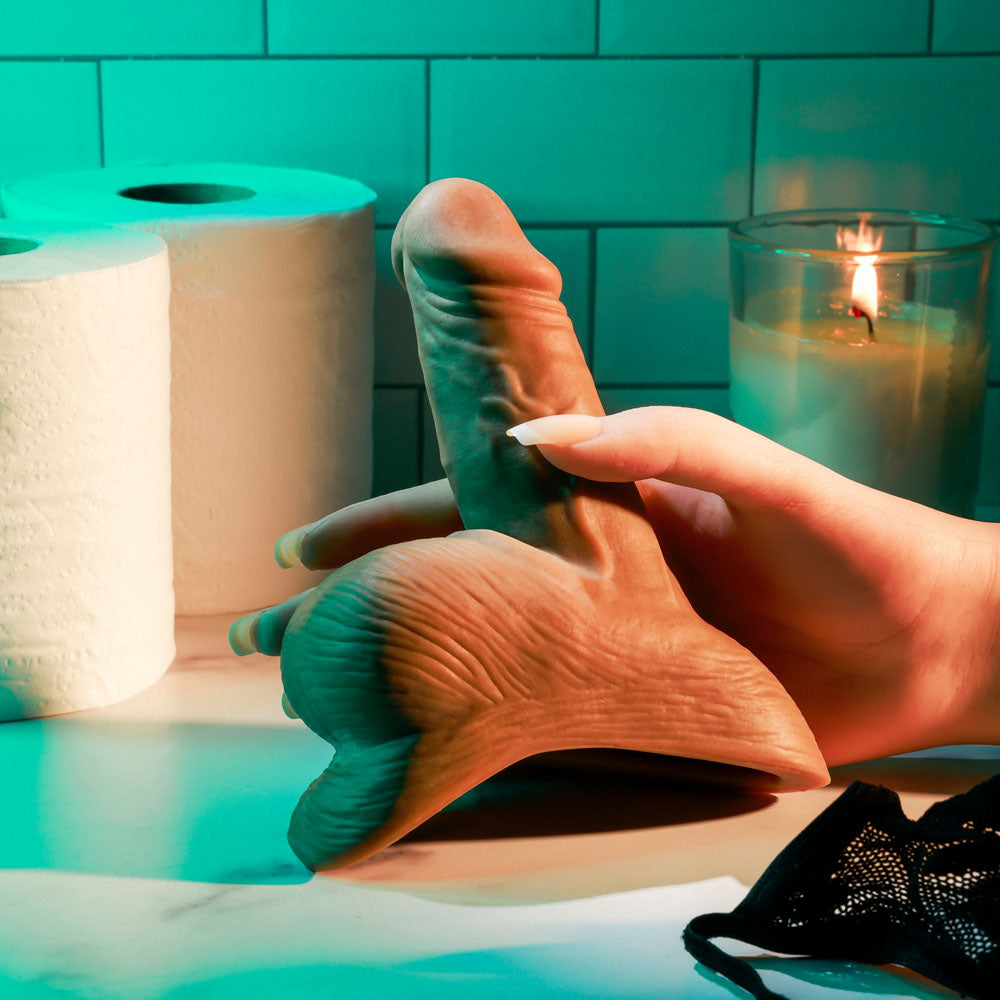 Gender X STAND TO PEE - Dark -  Realistic Stand-To-Pee Funnel with textured details on a table with candles.