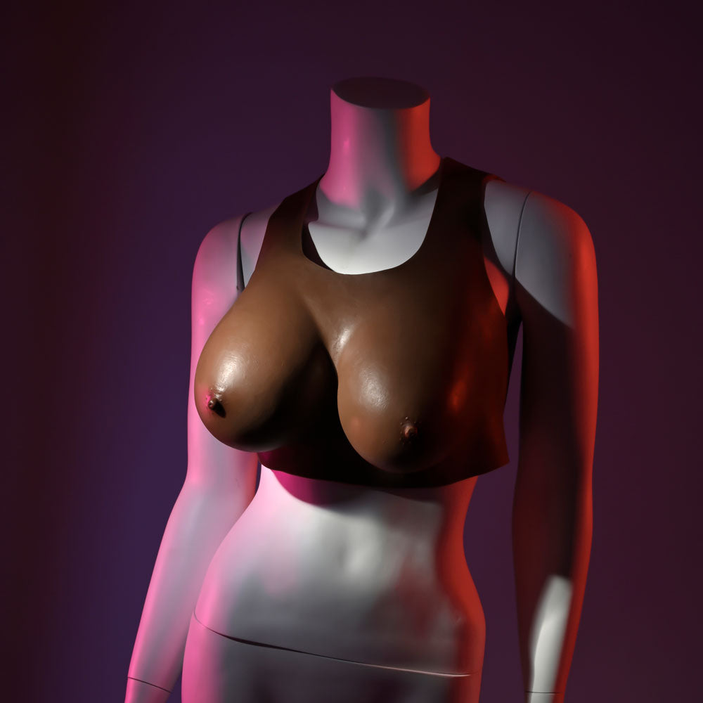 Gender X UNDERGARMENTS wearable breasts D-cup displayed on a mannequin, featuring a lifelike soft design.