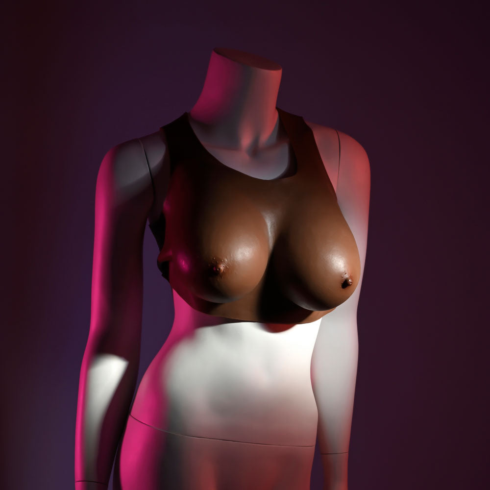 Realistic mannequin showcasing wearable breasts D-cup under a vest, perfect for enhanced comfort and confidence.