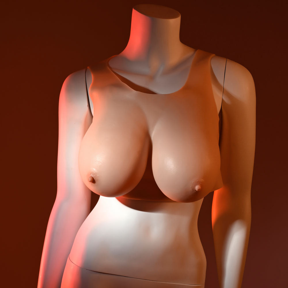Gender X E-Cup wearable breasts E-cup on a mannequin showcasing natural shape and soft touch.