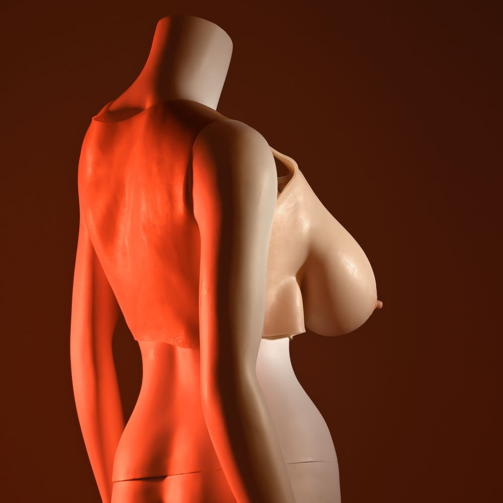 Gender X UNDERGARMENTS - PLATE E-CUP - Light -  Wearable Breasts - E-Cup Size on a mannequin under red lighting.