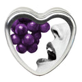 Edible Massage Candle - Grape Flavoured - 113 g in a heart-shaped container with grapes and a mouth.