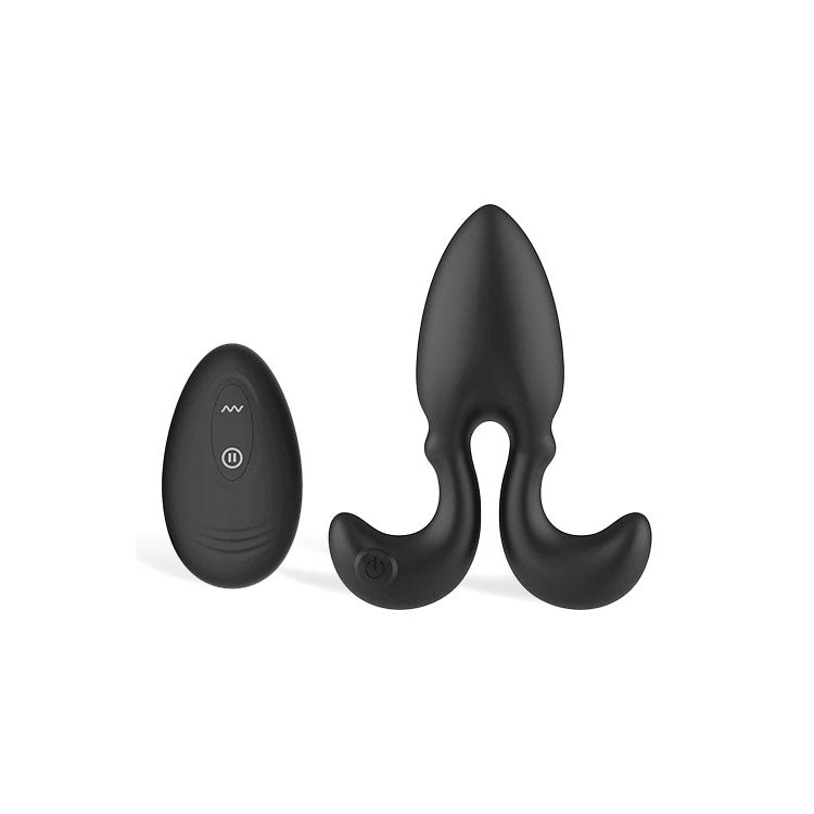 Adam & Eve OMEGA Vibrating Plug -  10 cm USB Rechargeable Vibrating Butt Plug with Remote next to its remote control.
