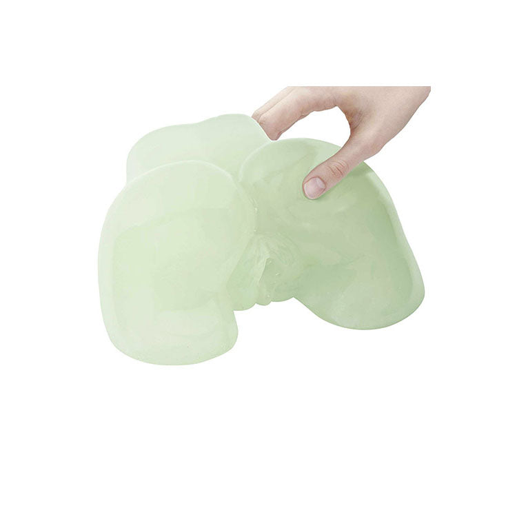 Adam & Eve GLOW IN THE DARK PEEK-A-BOOTY - Glow In Dark Doggy Style Mini Masturbator in hand, highlighting its glow-in-the-dark feature.