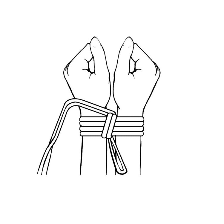 Hands bound with 3 metre soft bondage rope for erotic control and bondage play.