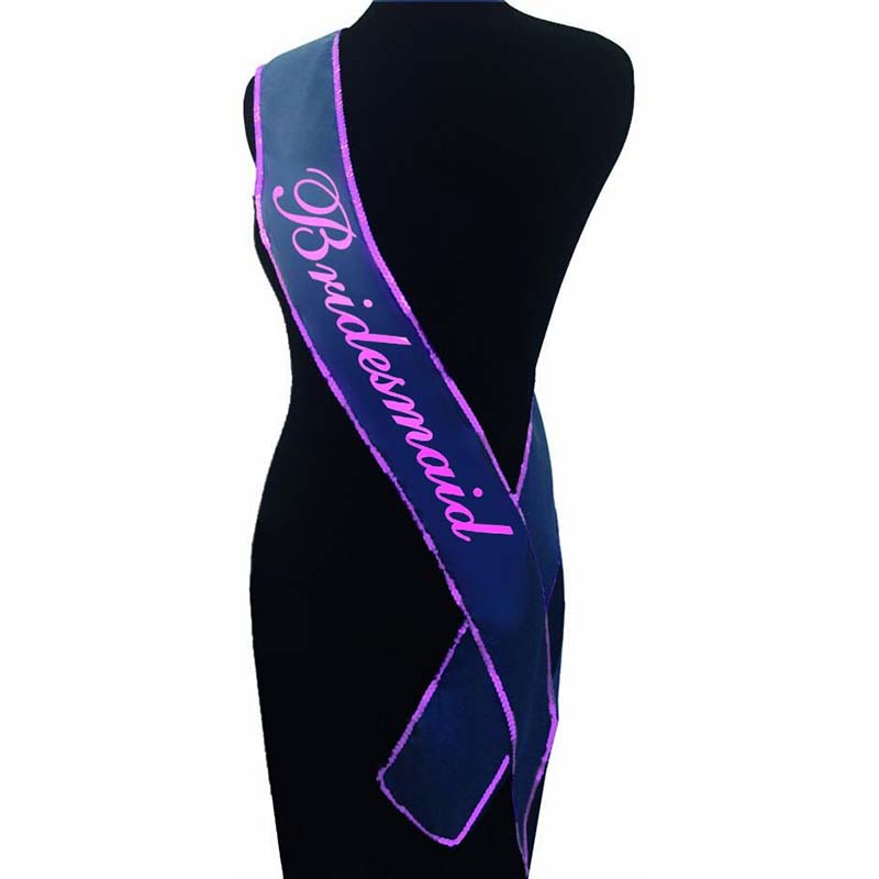 The Bride's Maid Sash - White Hens Party Sash displayed on a mannequin, showcasing its sparkly design for bridal parties.