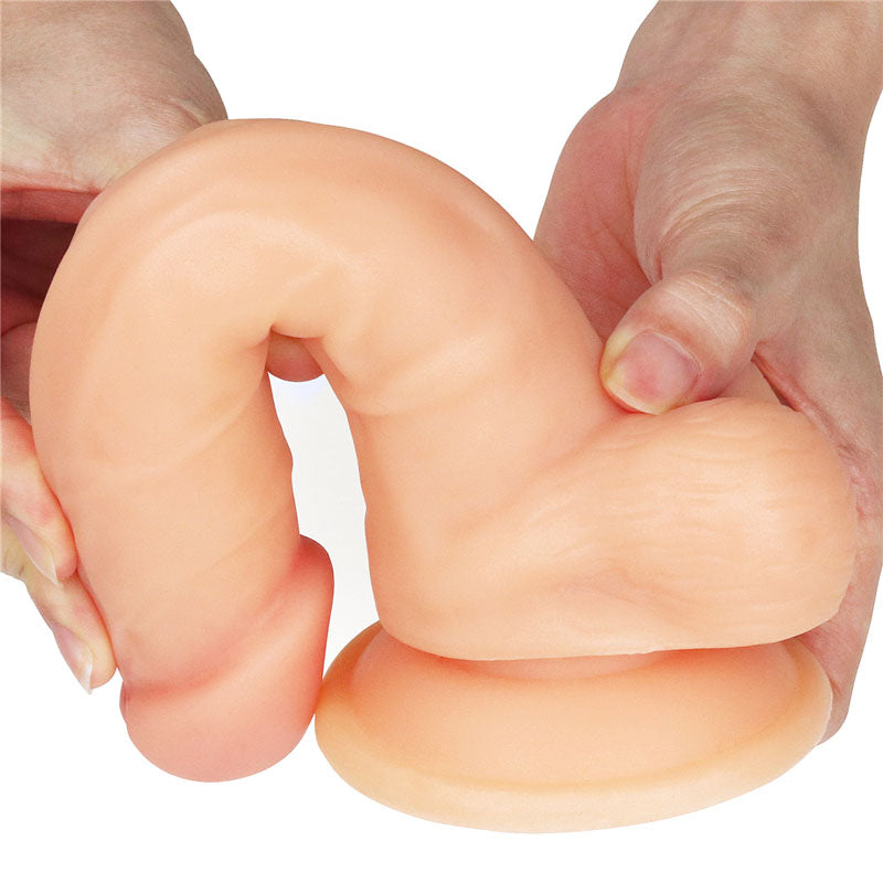 The Ultra Soft Dude - 20.3 cm (8'') Dong held in hands, showcasing its lifelike texture and design.
