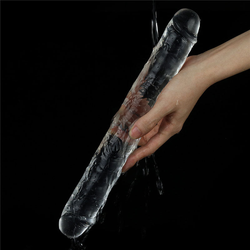 Flawless Double Dildo 12'' - 30 cm Double Dong, a transparent double-ended dildo being held, perfect for intimate essentials.