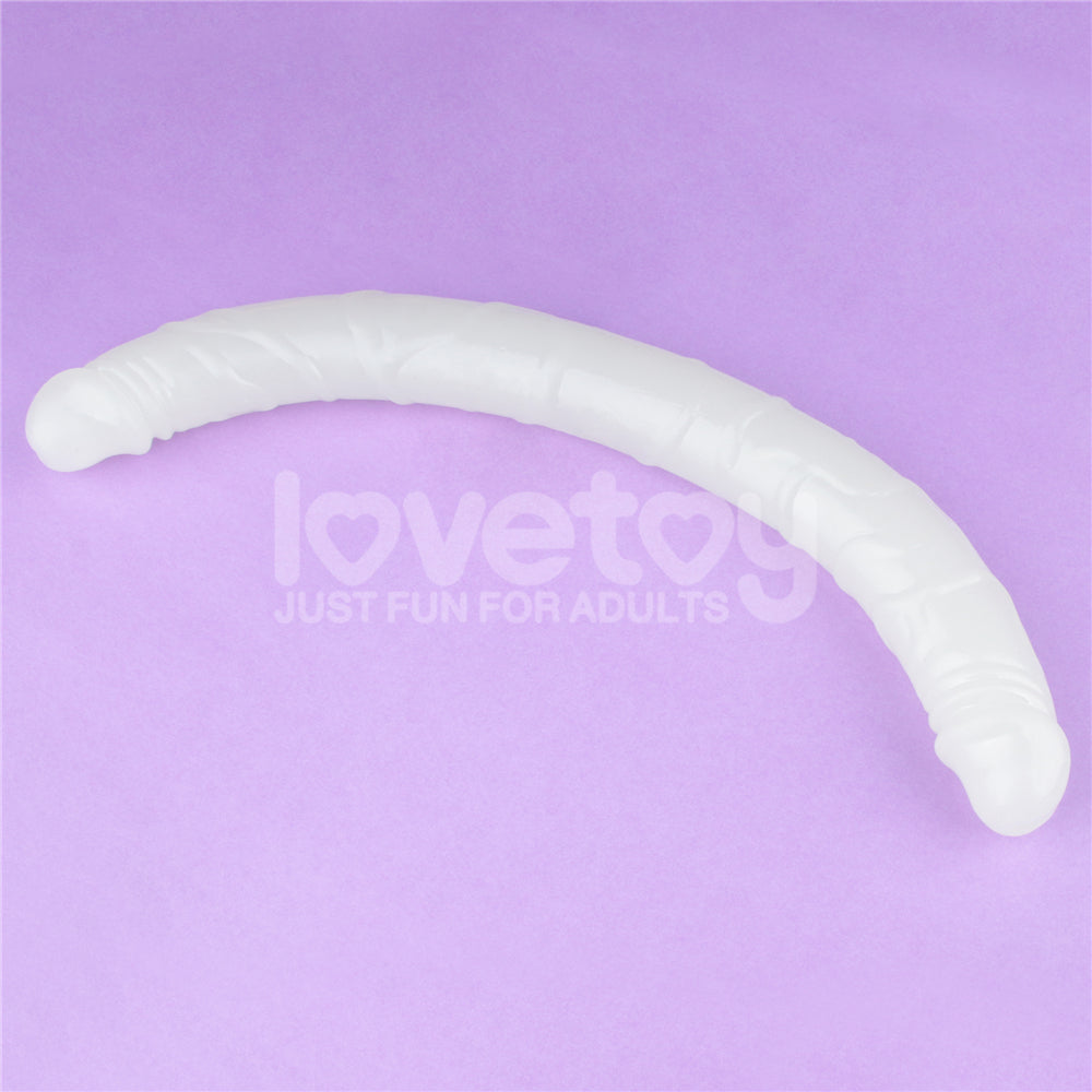 Lumino Play 18.5'' Double Dildo - Glow in the Dark 47 cm Double Dong on a purple background