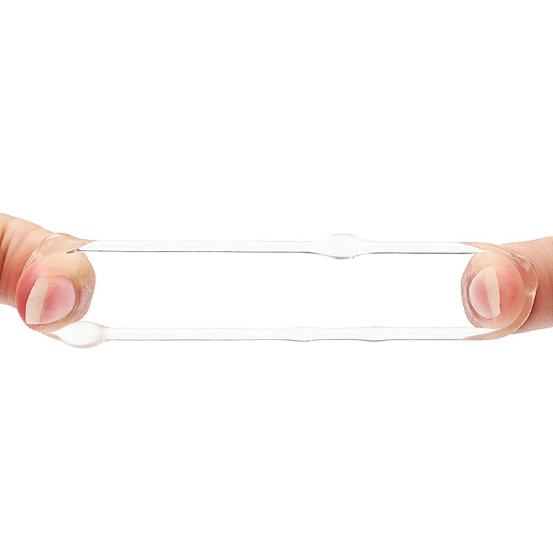 Power Plus Triple Beaded Ring Set -  Cock Rings - Set of 3 held between fingers, showcasing its flexible material.