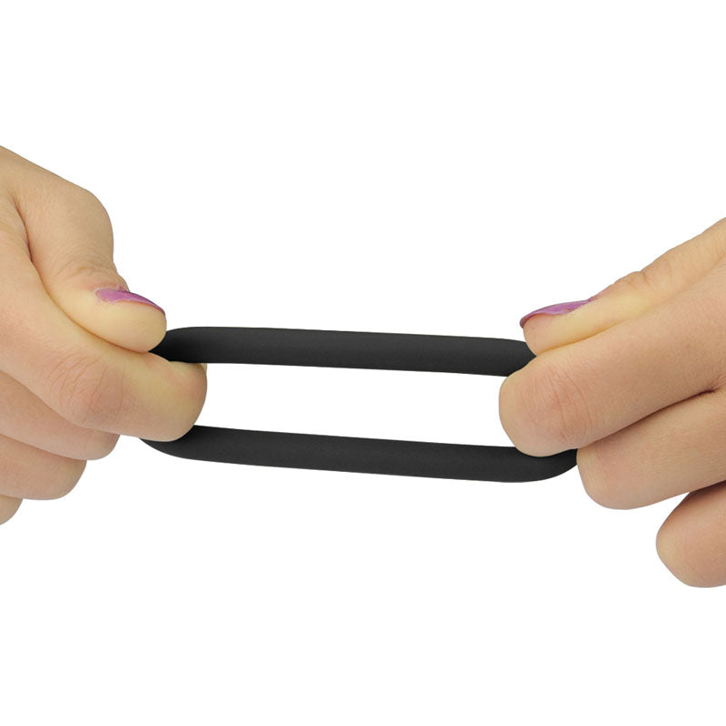Power Plus Soft Silicone Snug Ring -  Cock Rings - Set of 3 Sizes being stretched by hands.