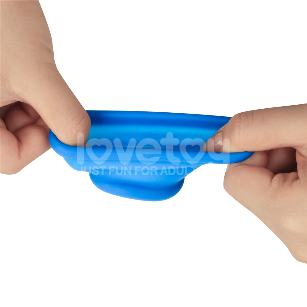 Pinnacle Pro Tapered Squeeze -  Ball Stretcher in blue, showcasing flexibility and ergonomic design for intimate essentials.