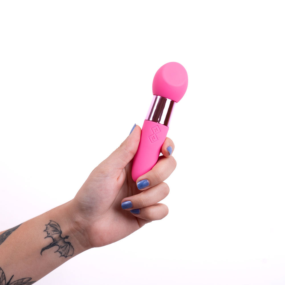 Maia RINA - Pink - Pink 13.3 cm USB Rechargeable Vibrator held in a hand with tattoos.