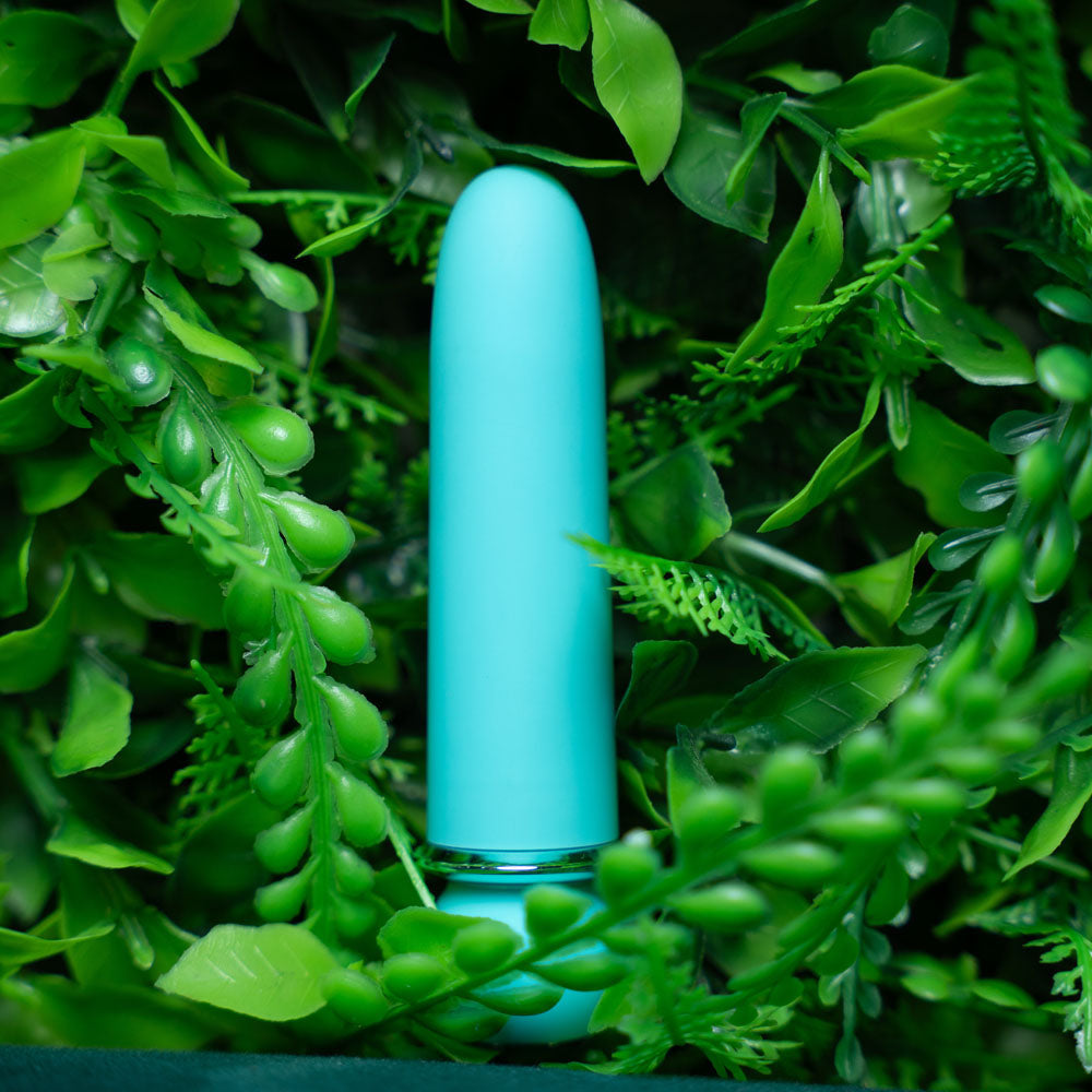 Maia JAGUAR -  -  10.1 cm USB Rechargeable Bullet surrounded by green foliage.