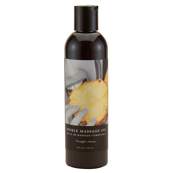 Edible Massage Oil - Pineapple Flavoured - 237 ml Bottle in a sleek black bottle for intimate and sensual experiences.