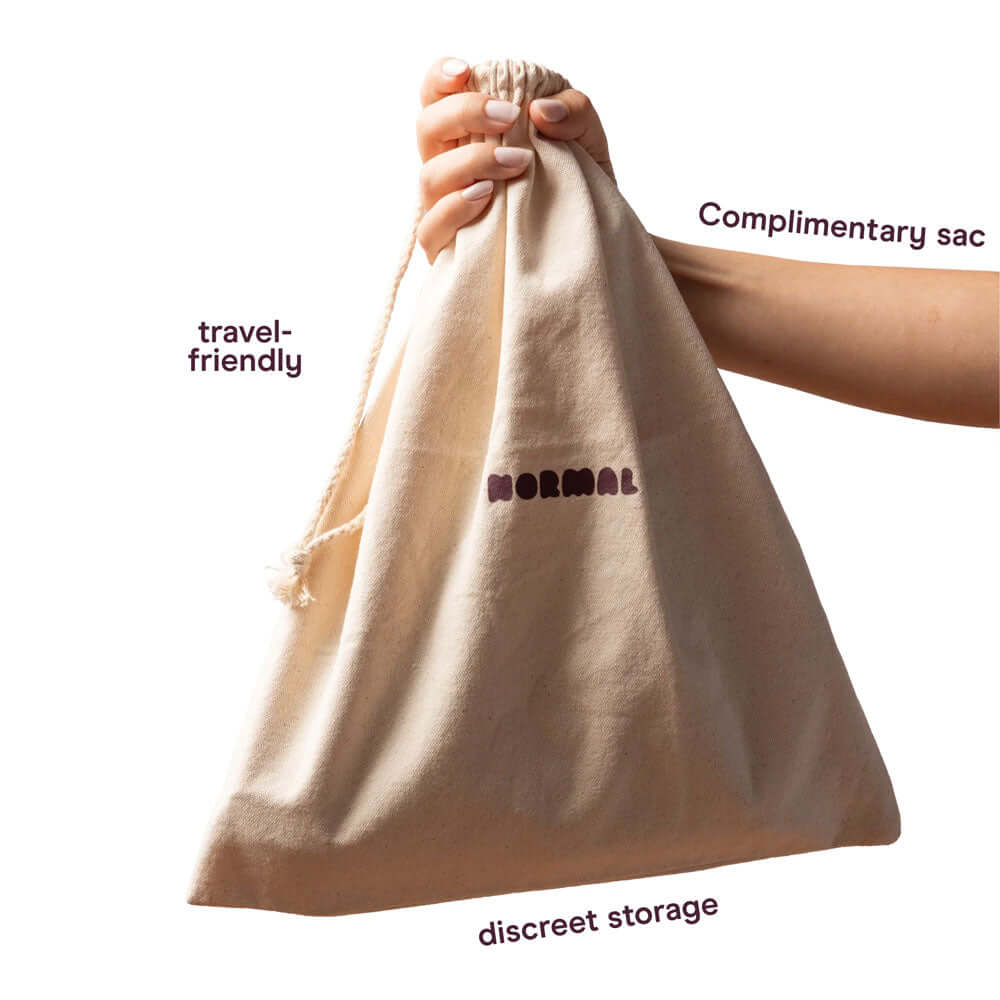abbie x Normal The Kink Kit - 4 Piece Bondage Kit presented in a travel-friendly, discreet storage sac.