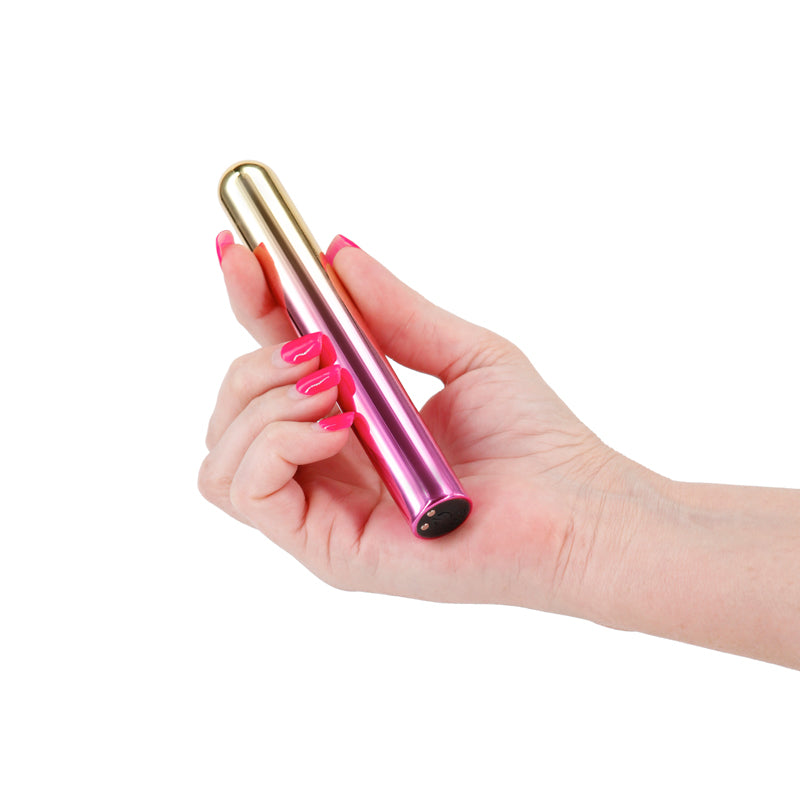 Chroma Sunrise - Large - Metallic Pink/Gold 13.8 cm USB Rechargeable Vibrator held in hand with vibrant nails.