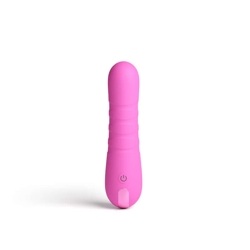 USB rechargeable vibrator in pink silicone with textured design and power button.