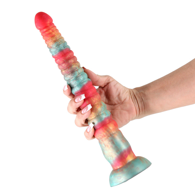 Colours Stacked - 12'' Dildo - Red/Gold - Red/Gold 30.6 cm Fantasy Dildo in hand showing its tri-coloured silicone design.