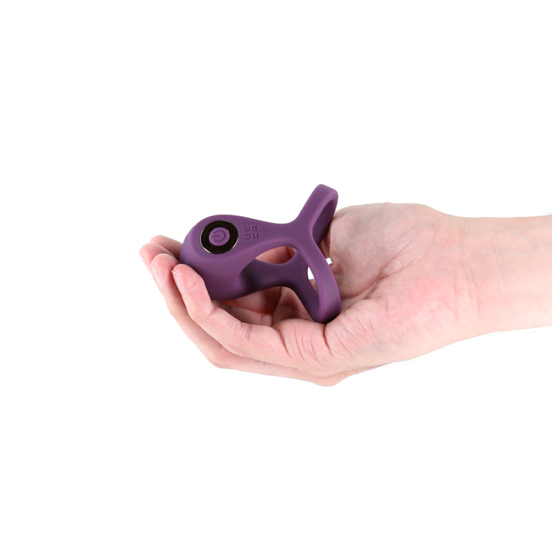 INYA Valiant - Berry -  USB Rechargeable Vibrating Cock Ring held in hand, showcasing its design for intimate essentials.