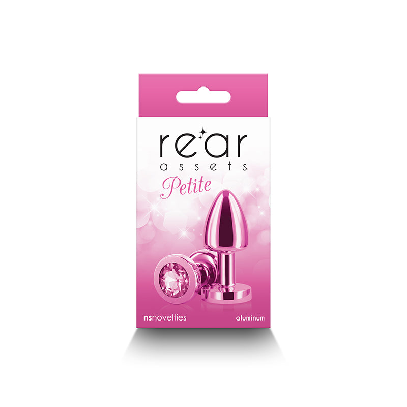 Rear Assets Petite -  -  6 cm Metal Butt Plug with  Round Gem Base in pink packaging.