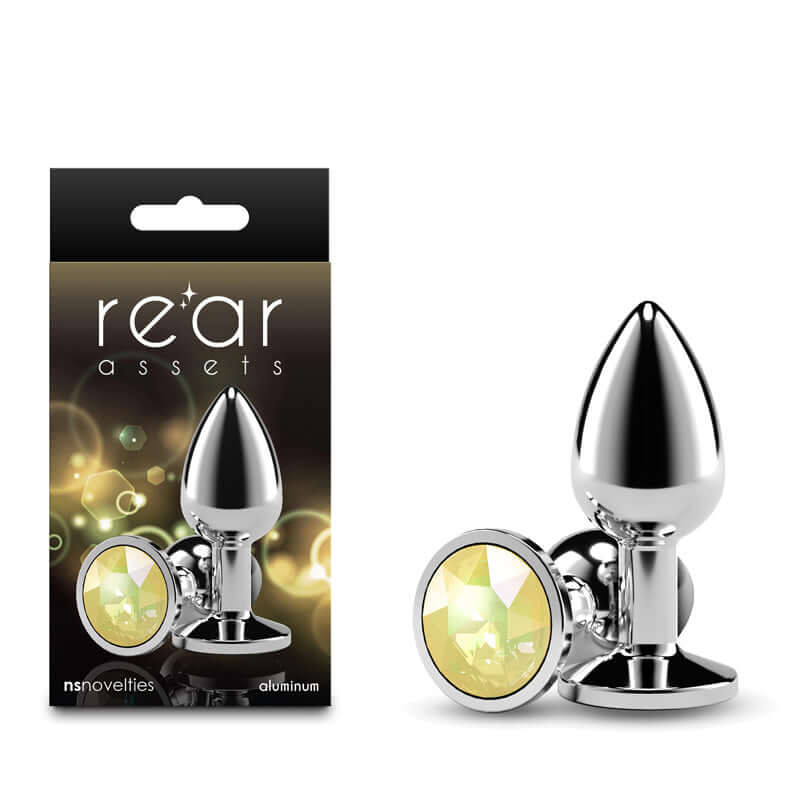 Rear Assets silver small anal plug with yellow gem base, aluminum, lightweight design for sensual excitement.