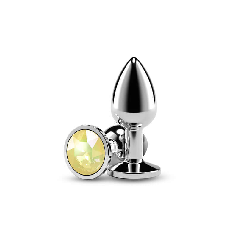 Yellow gem anal plug featuring a chrome-plated design with a large yellow gem at the base, perfect for visual and sensual pleasure.