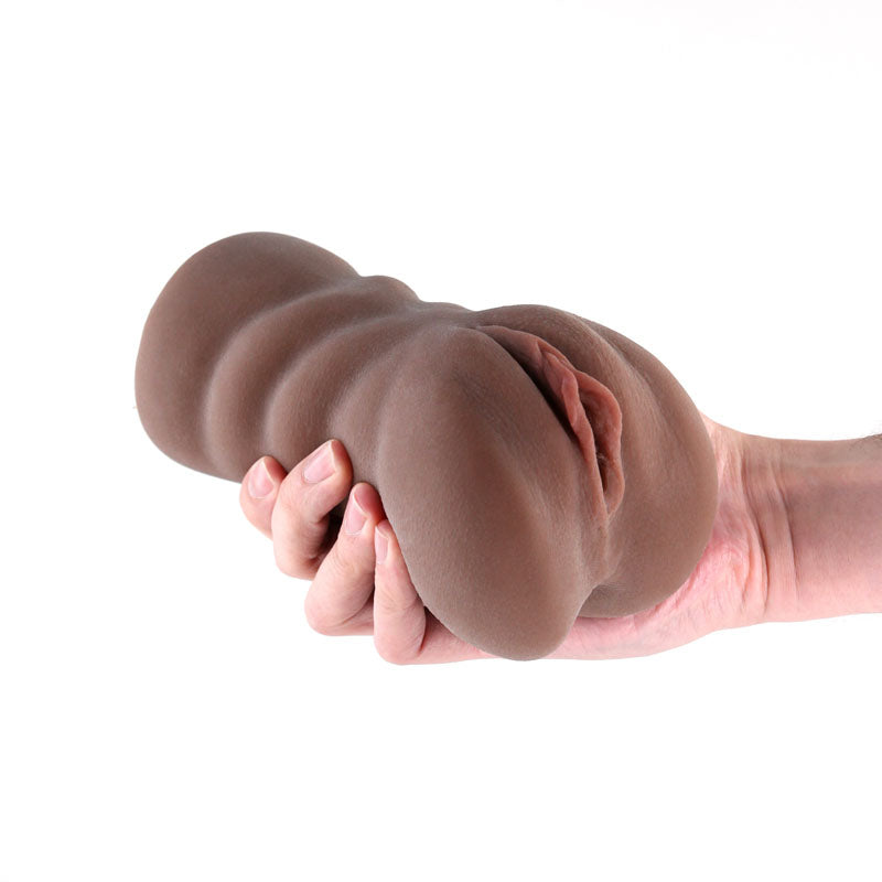 I Dream of MILF - Cassandra -  -  Vagina Stroker in hand, showcasing its ultra-lifelike texture and design.