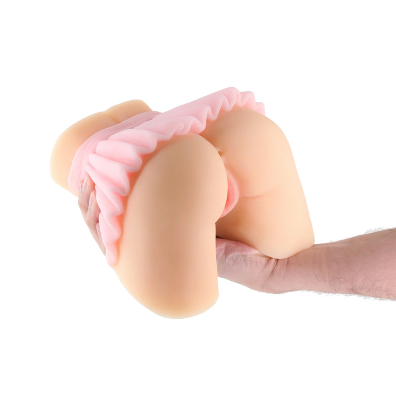 Barely Legal Senna - White -  Mini Doggy Style Masturbator being held in hand, showcasing its realistic design and texture.