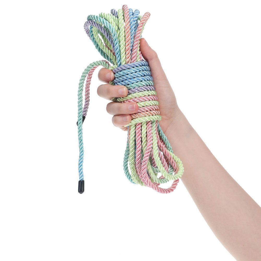 OUCH! Bondage Rope - 10 M - Multicolour 1 - Multicoloured Nylon Bondage Rope - 10 metre Length held in a hand.