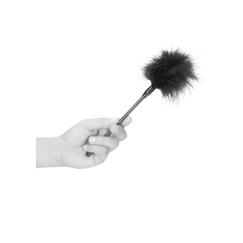 OUCH!  & White Feather Tickler -  Feather Crop in a hand, designed for intimate sensory play.