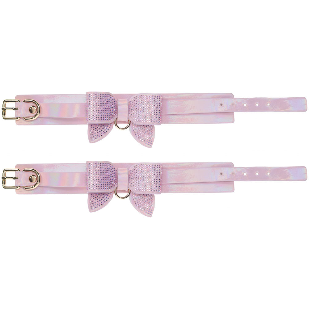 OUCH! Paris Collection - Handcuffs -  Restraints in stylish iridescent pink leather with decorative bows.