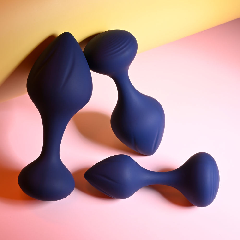 Playboy Pleasure TAIL TRAINER -  Butt Plugs - Set of 3 Sizes displayed on a colorful background.
