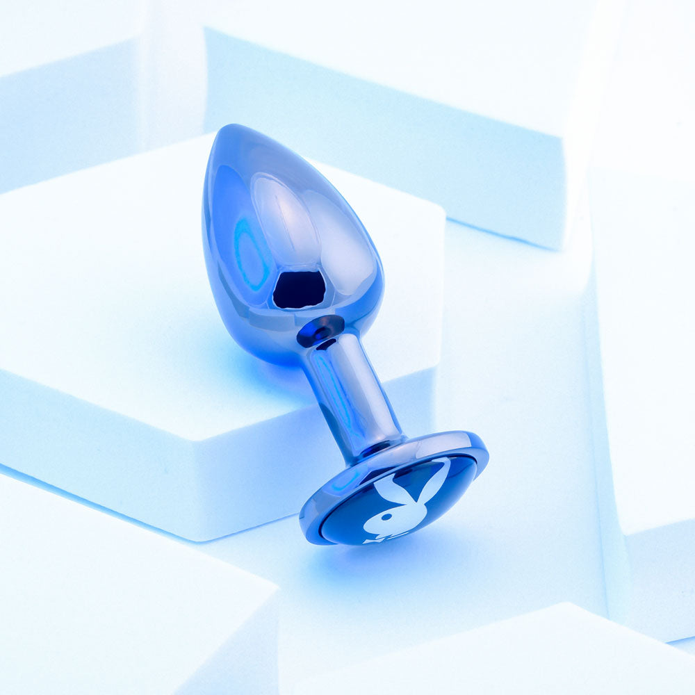 Playboy Pleasure TUX - Small - Metal 7.4 cm Small Butt Plug on a light background, showcasing its elegant design.