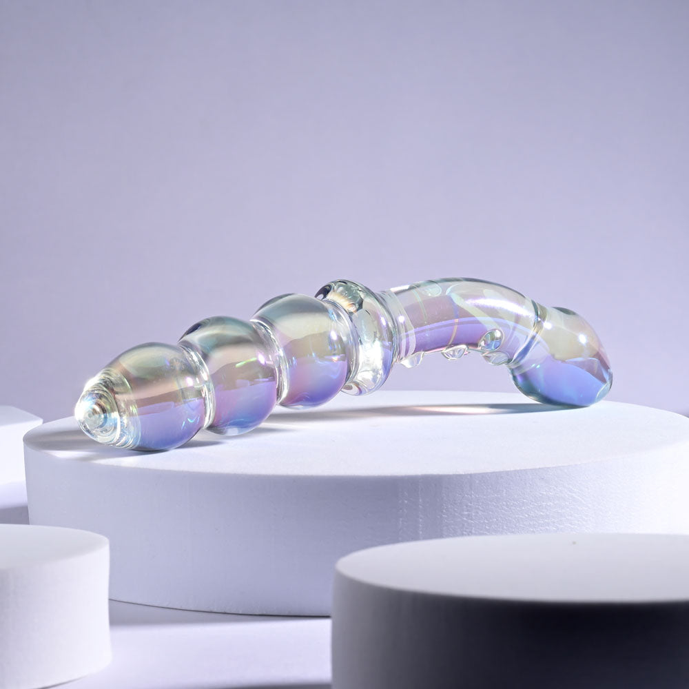 Playboy Pleasure JEWELS DOUBLE -  Glass 17.1 cm Double Ended Dildo showcasing a curvy, textured design on a display.