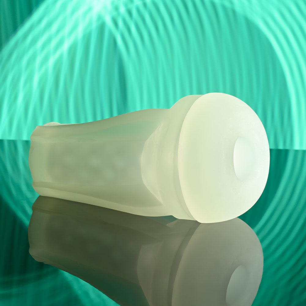 Playboy Pleasure THE URGE SMALL - Clear Small Stroker showcasing a sleek design against a vibrant background.