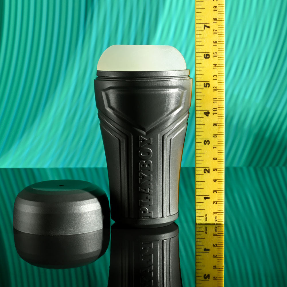 Playboy Pleasure THE URGE SMALL - Clear Small Stroker next to a ruler for size reference.