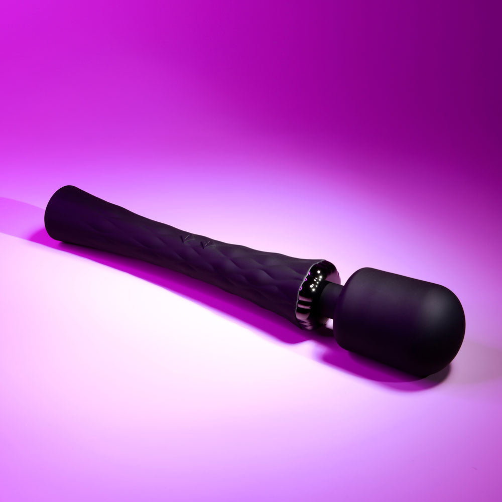 Playboy Pleasure ROYAL - 29.2 cm USB Rechargeable Massage Wand on a vibrant purple background.
