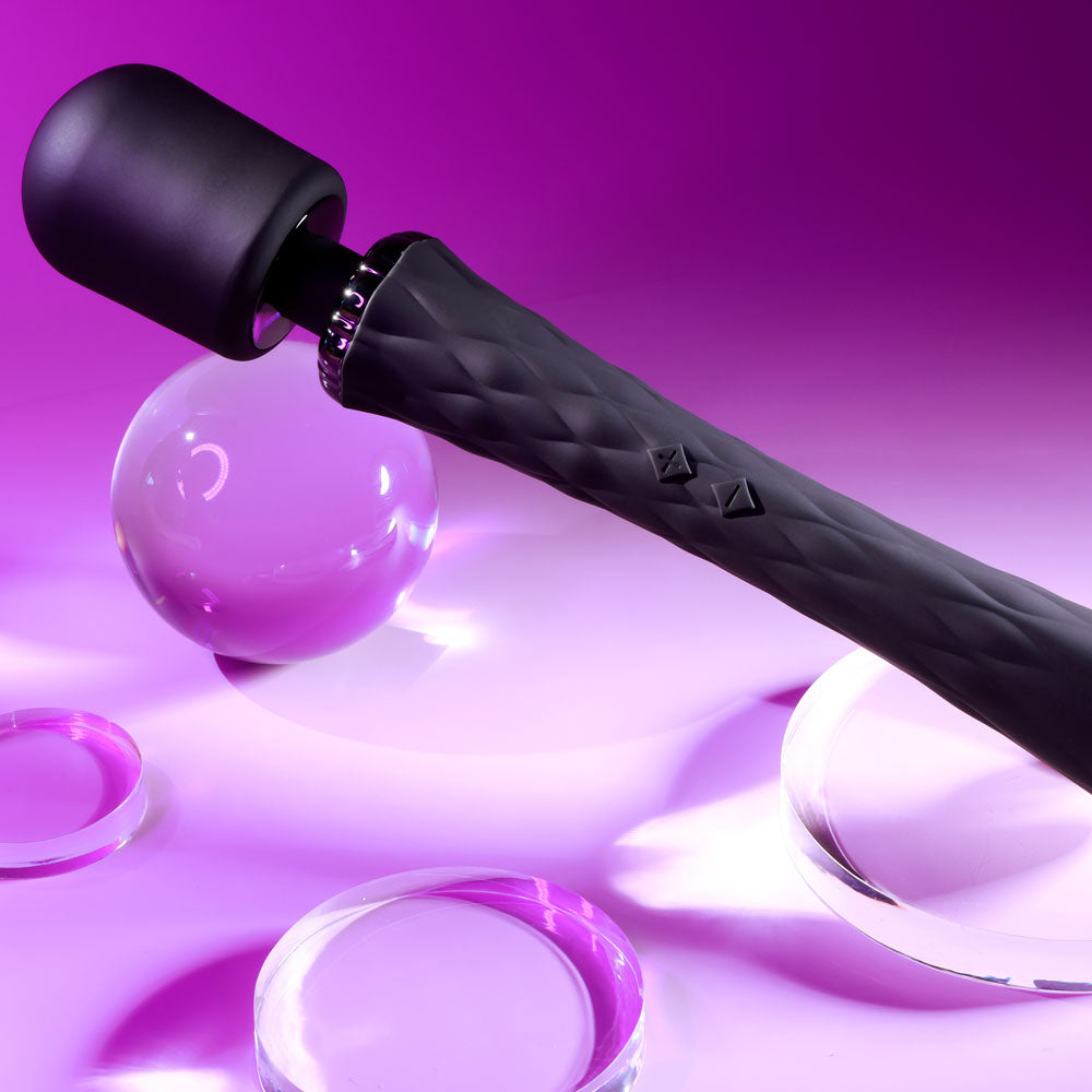 Playboy Pleasure ROYAL - 29.2 cm USB Rechargeable Massage Wand on a vibrant background with clear crystals.