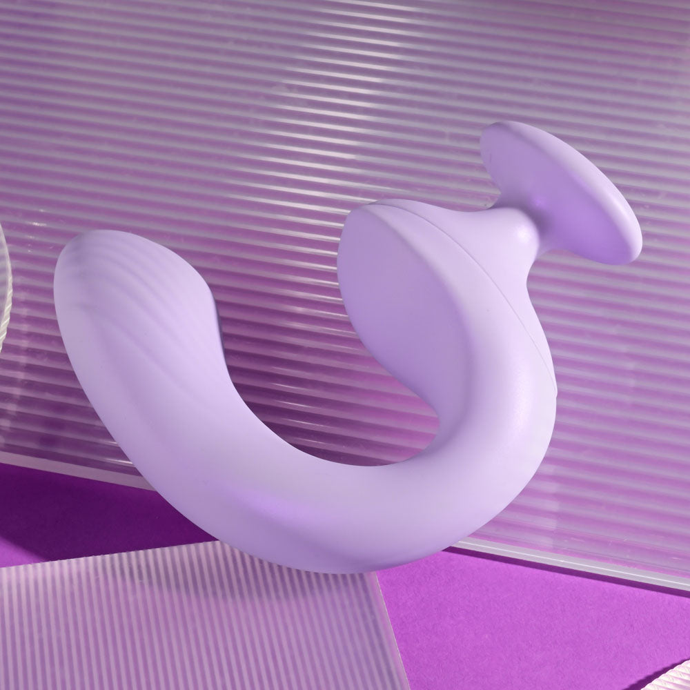 Playboy Pleasure REV ME UP - USB Rechargeable Dual Motor Curved Vibrator in soft purple texture.