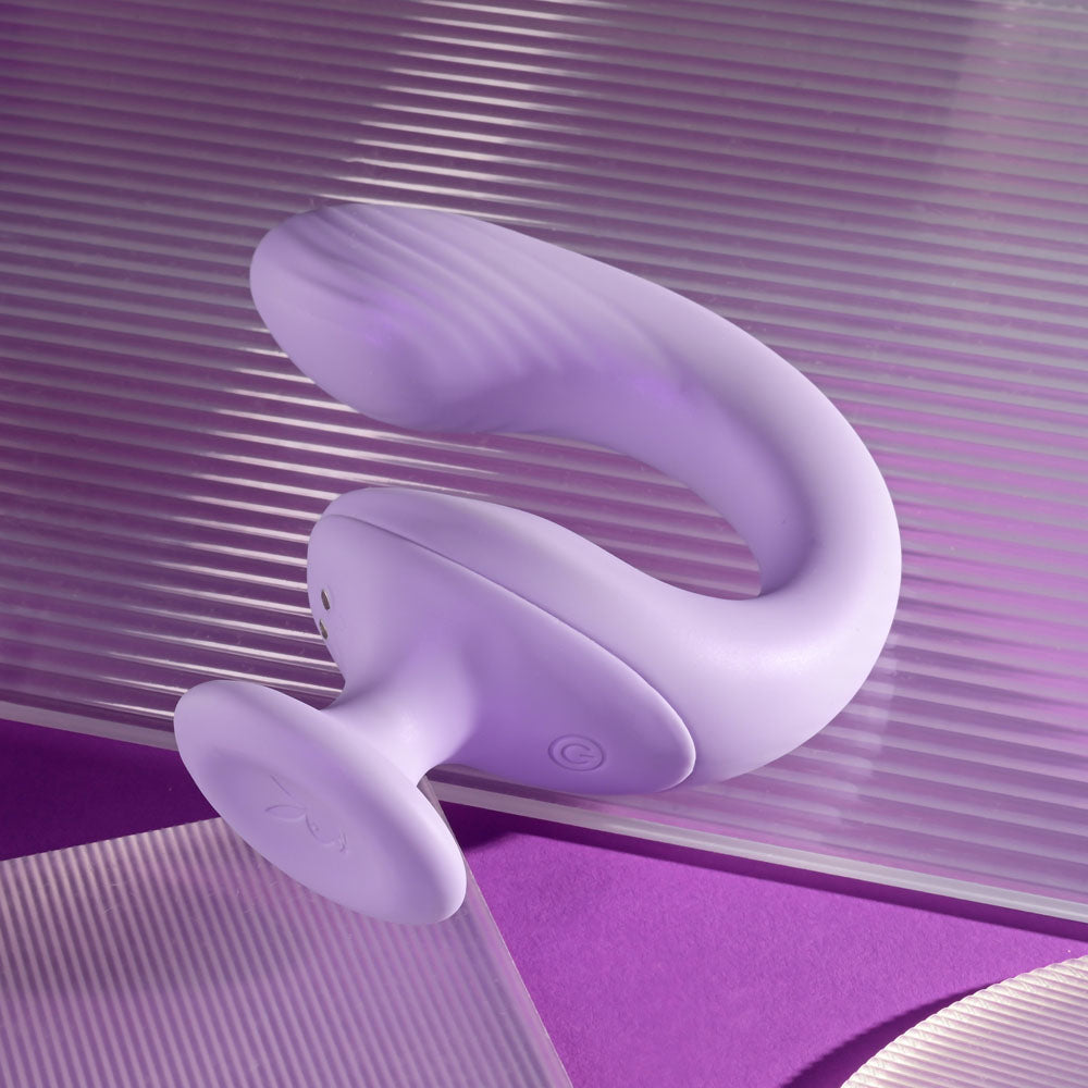 Playboy Pleasure REV ME UP -  USB Rechargeable Dual Motor Curved Vibrator in a sleek purple design.